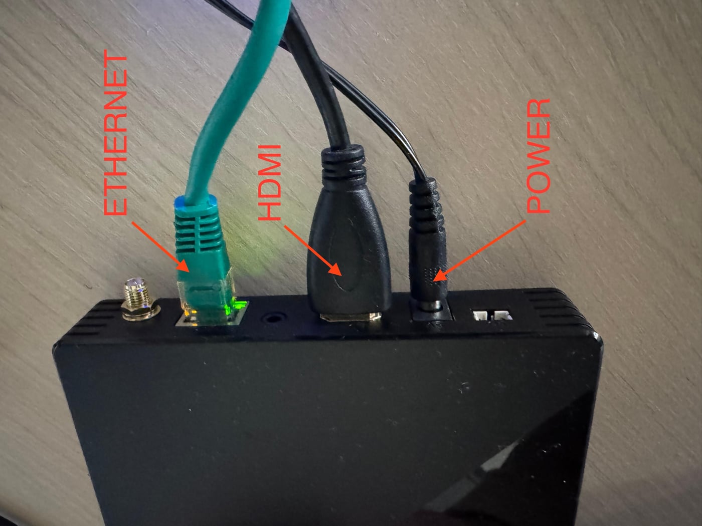 Cable connections on the back of the player — Ethernet, HDMI, Power
