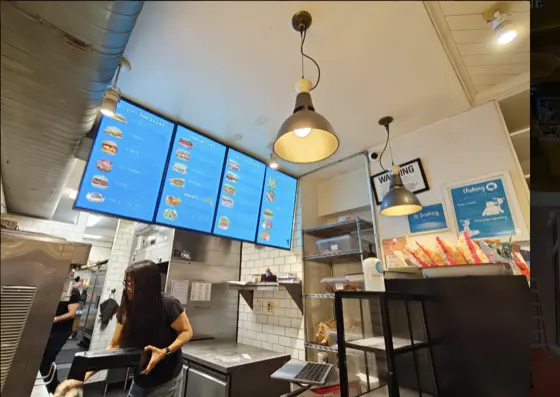 CrownTV digital menu board at Deli