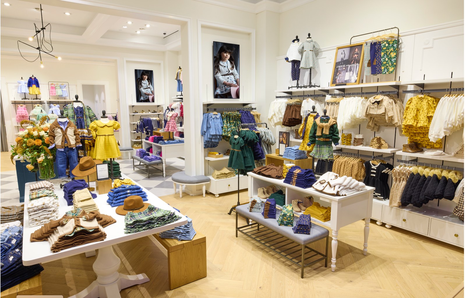 Samsung 4K displays integrated into Janie and Jack's gallery-style merchandising walls