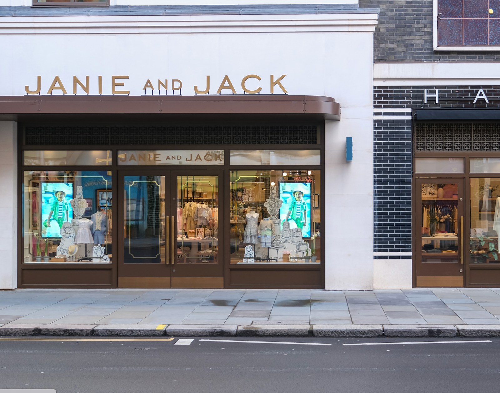 Janie and Jack London flagship storefront with digital window displays