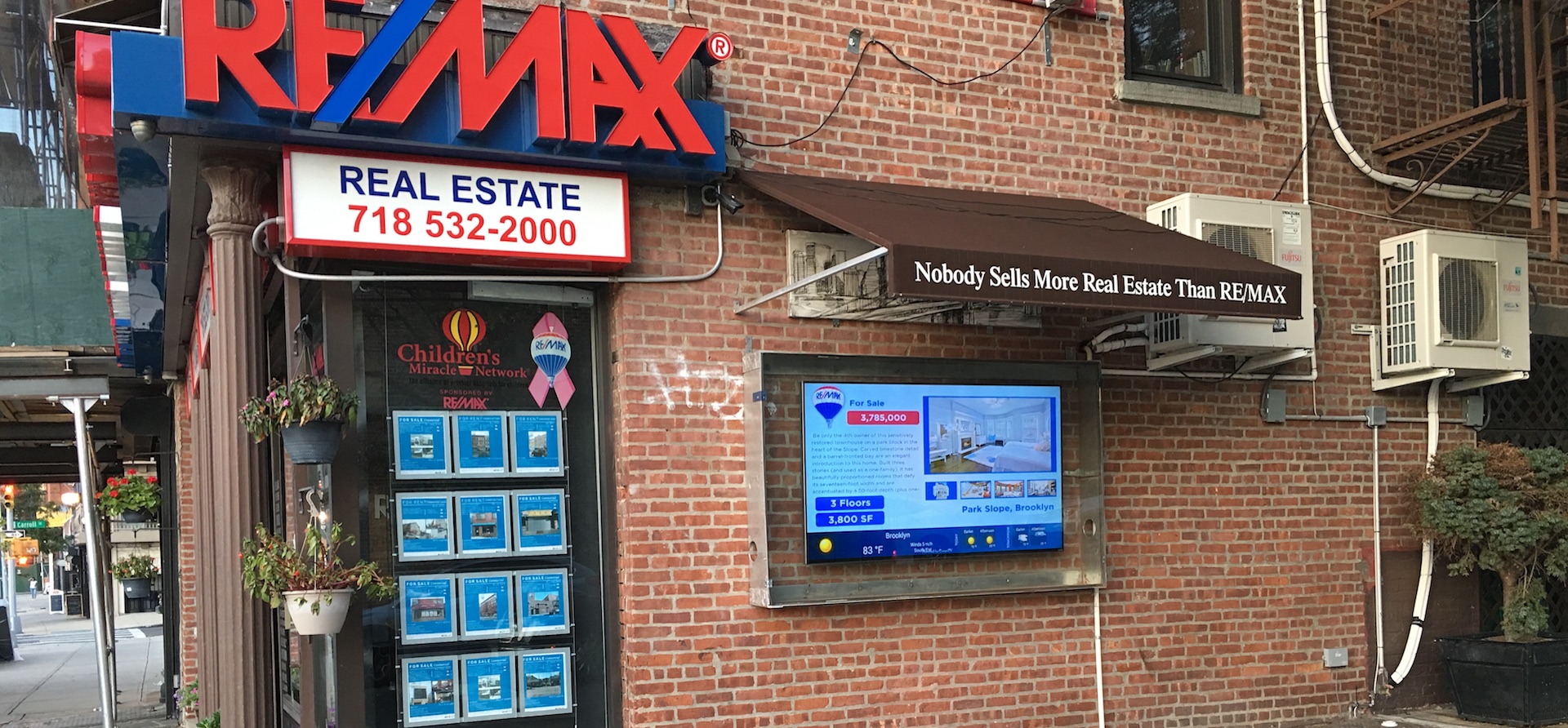 real estate digital signage, real estate window displays