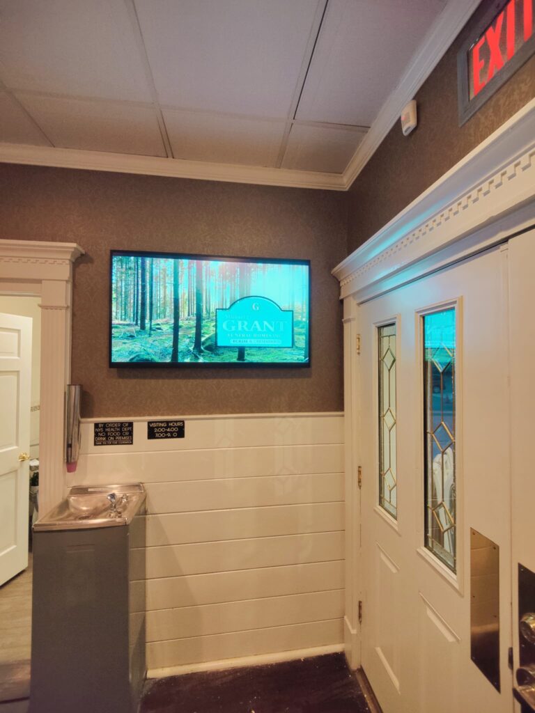 Michael J Grant Funeral Home digital signage lobby display