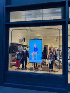 Janie and Jack storefront with synchronized CrownTV digital window displays