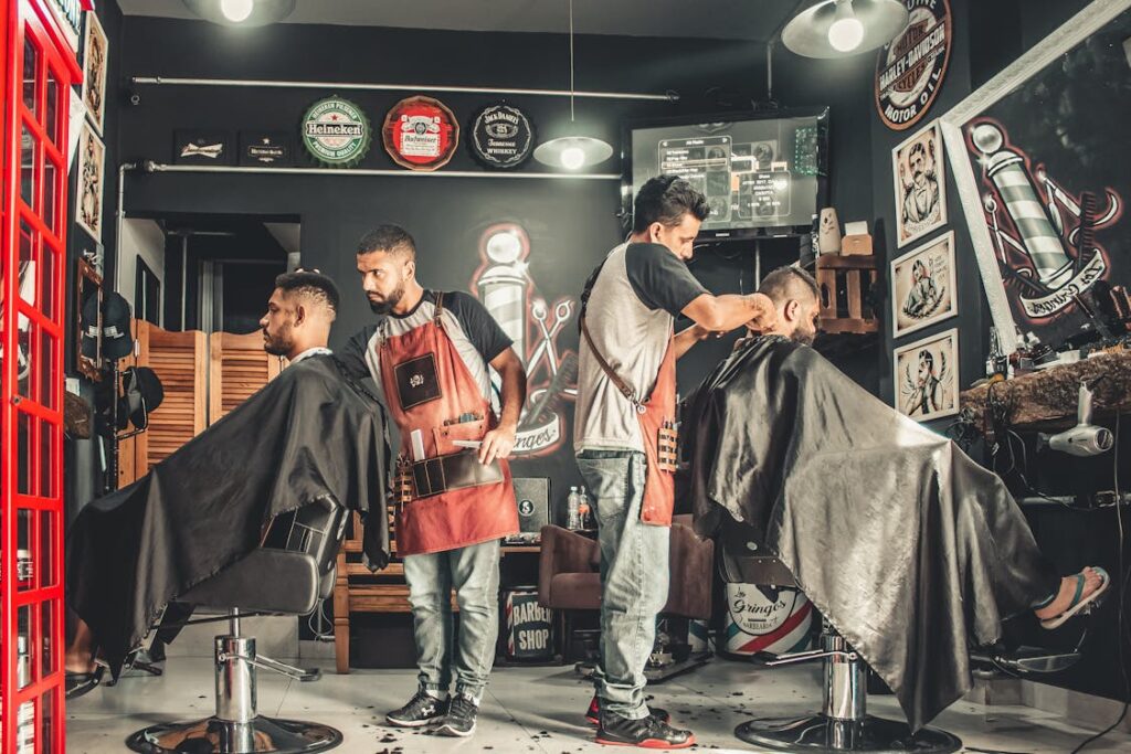 Interior of a modern barbershop with styling stations and professional atmosphere